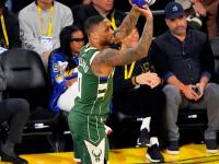 爱游戏官网入口-雄鹿遭遇绿军逆转，遗憾失利